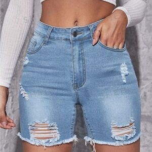 SHEIN Essnce Ripped Raw Hem Denim Shorts